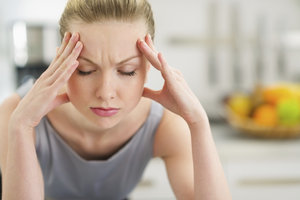 Stress kann Kopfschmerzen verursachen. 